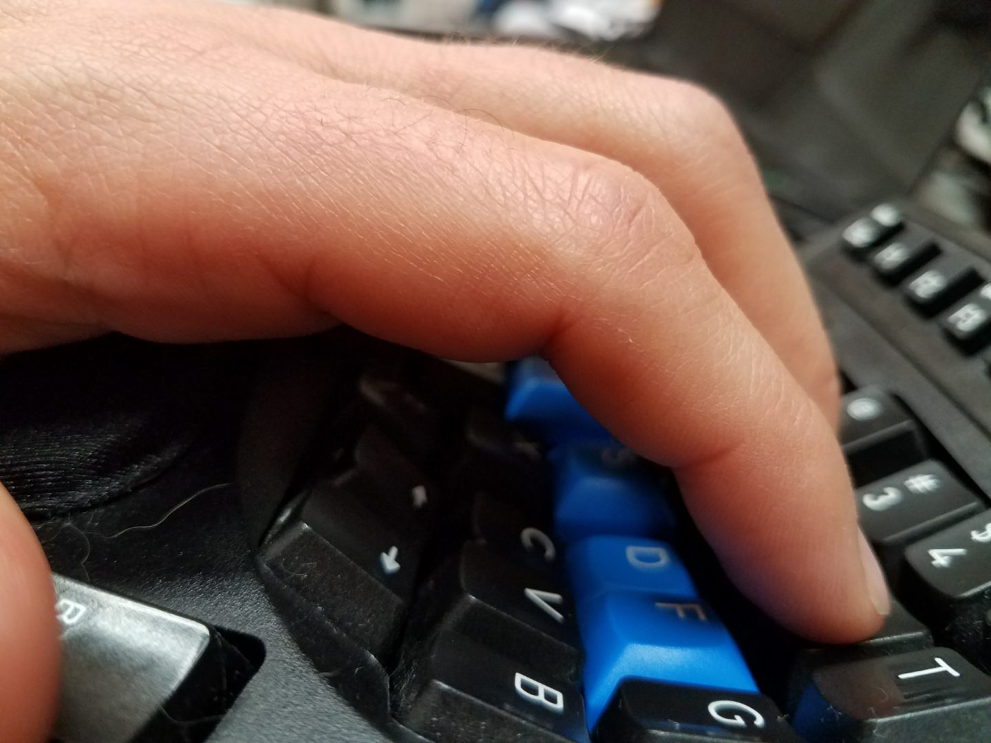 Fingers on a Kinesis keyboard